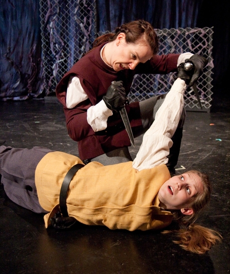 Macbeth (Kathrynne Wolf) defeats Young Seyward (Gillian N. Humiston) Photo